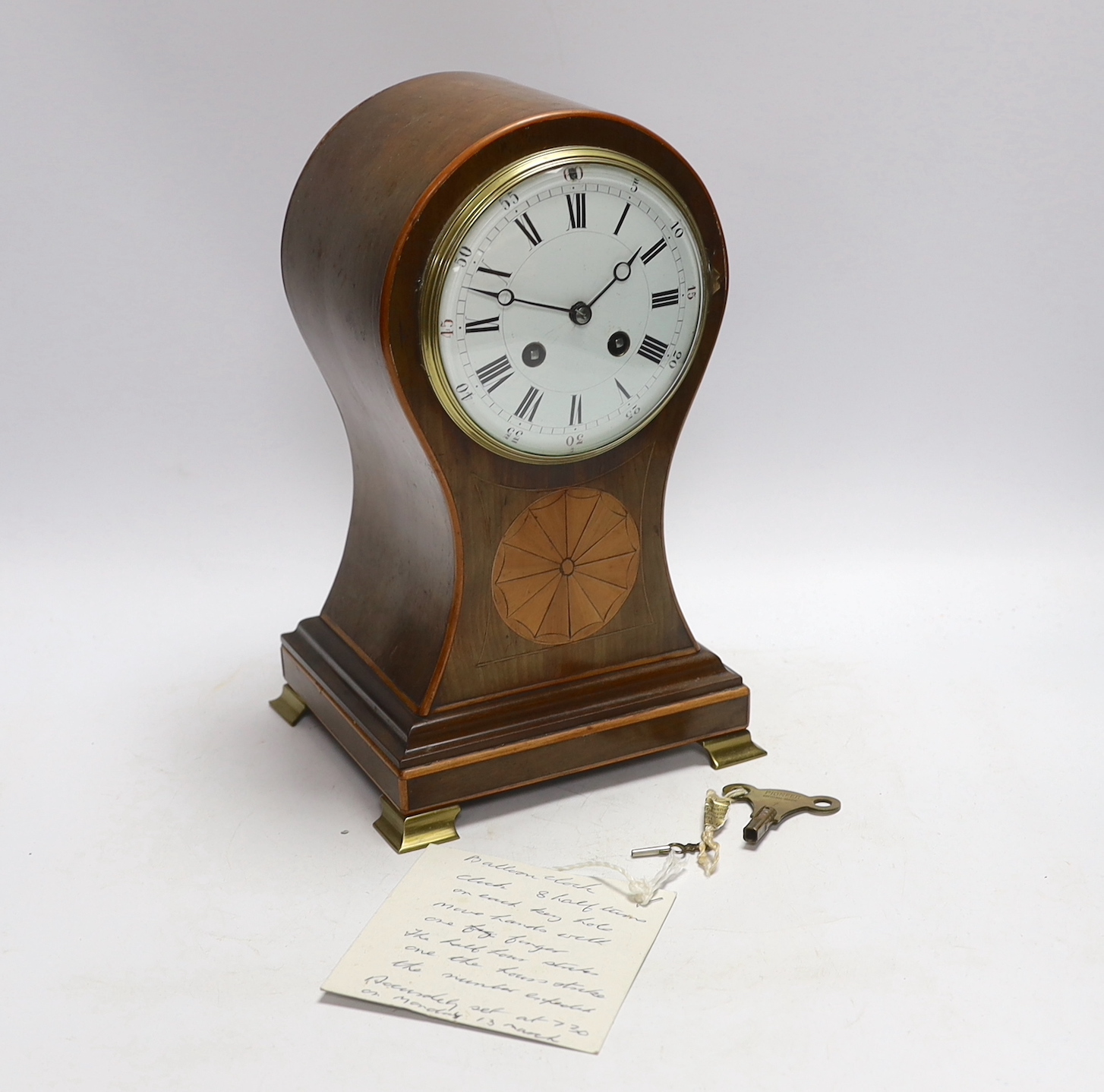 An Edwardian inlaid mantel clock, with key, 30cm